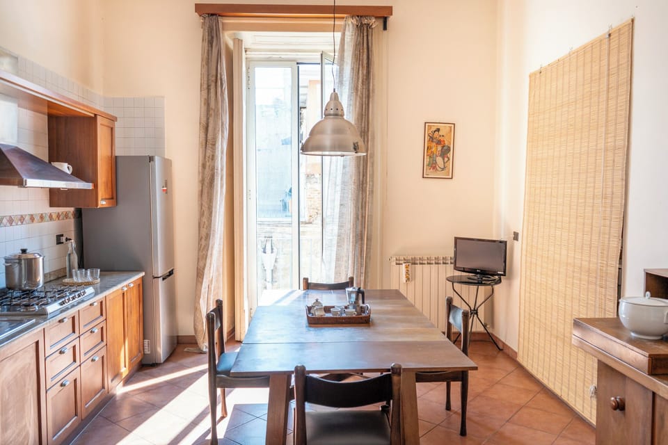 Apartment, 4 Bedrooms | Private kitchen | Full-size fridge, microwave, oven, stovetop
