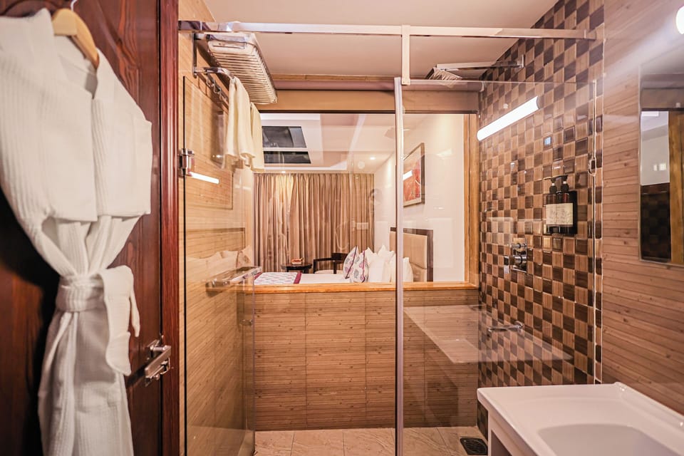 Shower, free toiletries, slippers, towels