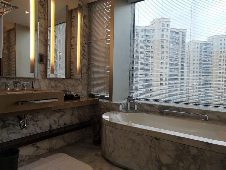 Shower, free toiletries, hair dryer, slippers