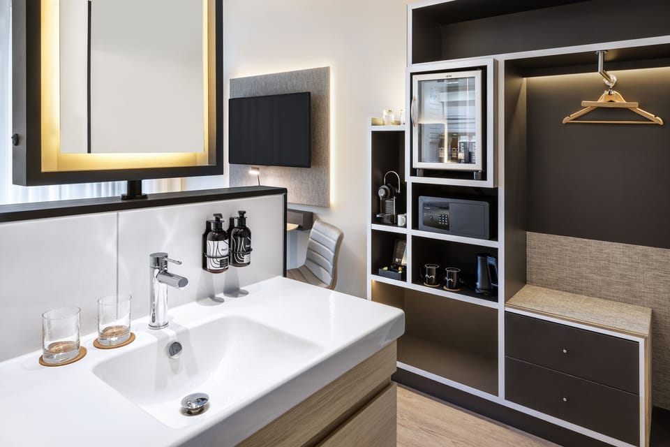 The Innside Room | Bathroom | Eco-friendly toiletries, hair dryer, towels, soap