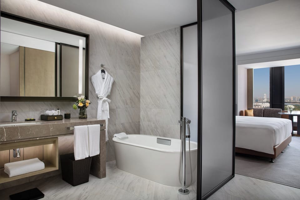 Separate tub and shower, deep soaking tub, rainfall showerhead