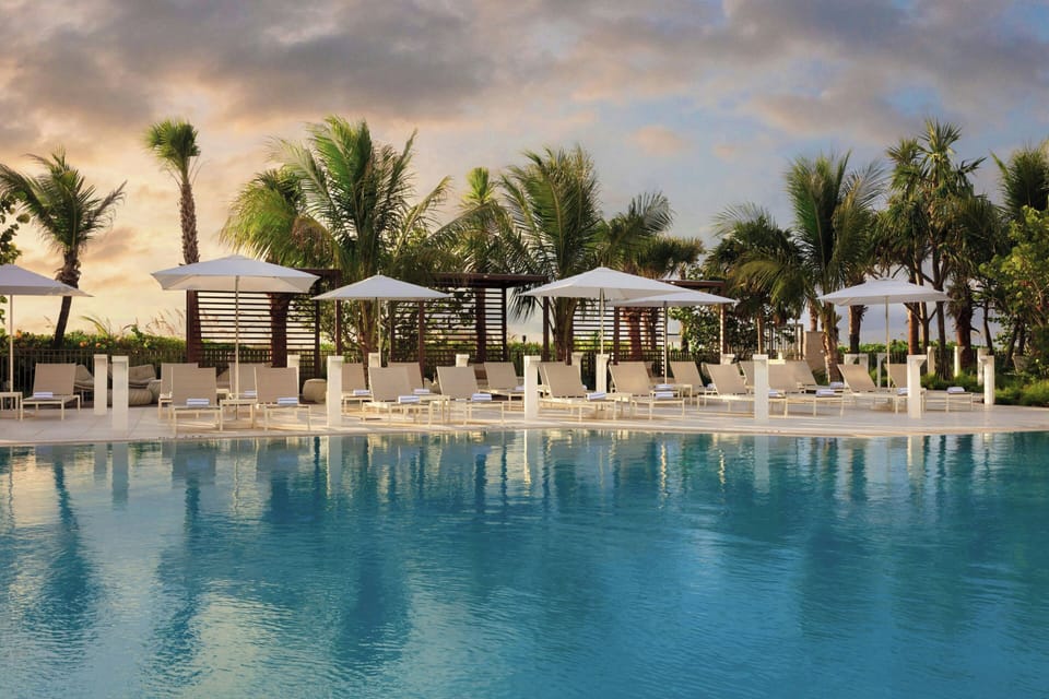 Outdoor pool, open 10:00 AM to 6:00 PM, cabanas (surcharge)