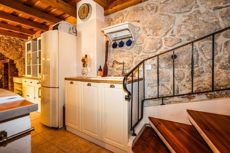 Villa | Private kitchen | Fridge, microwave, oven, stovetop