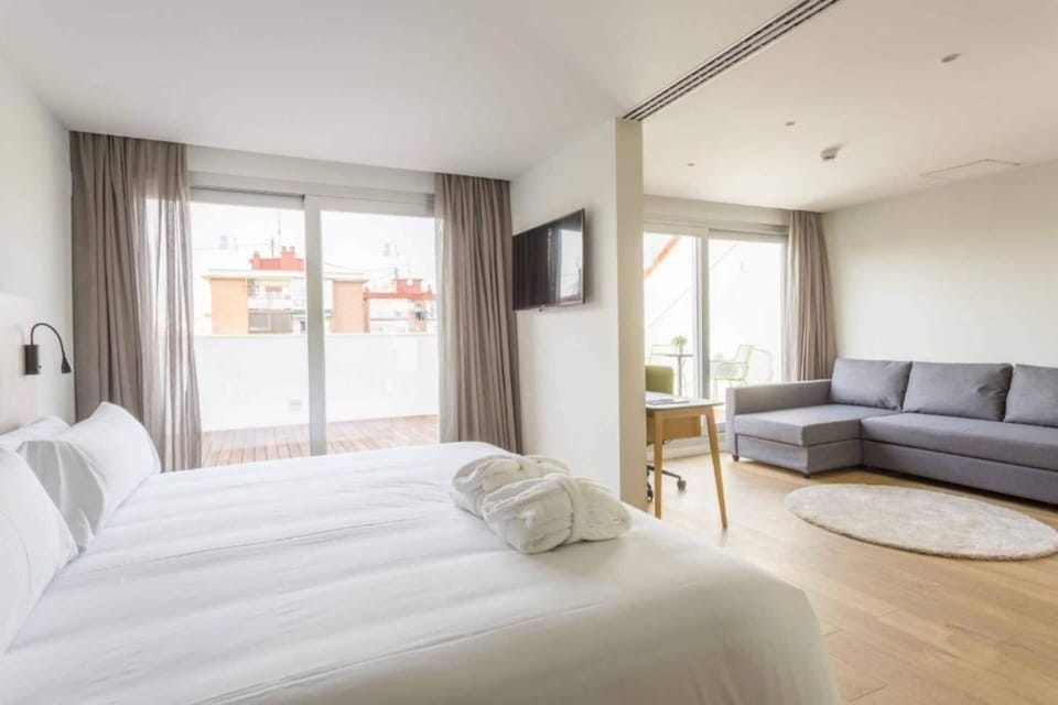 Junior Suite, Terrace | Down comforters, minibar, in-room safe, desk