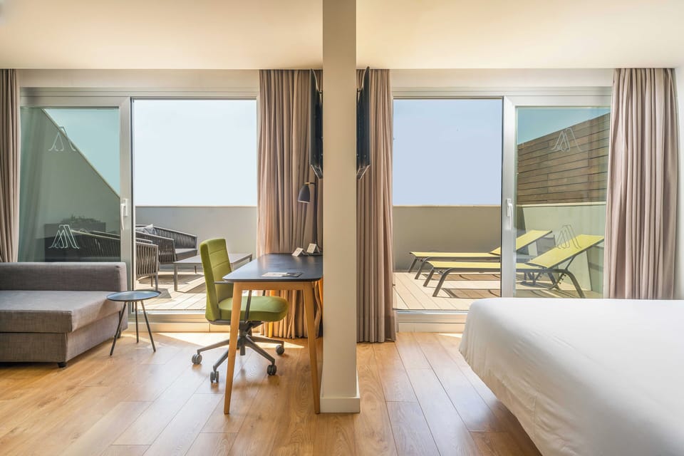 Junior Suite, Terrace | Down comforters, minibar, in-room safe, desk