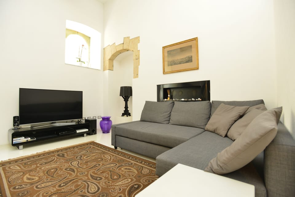 Apartment | Living area | 49-inch flat-screen TV with cable channels, TV