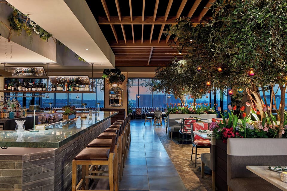 2 bars/lounges, rooftop bar, tapas bar