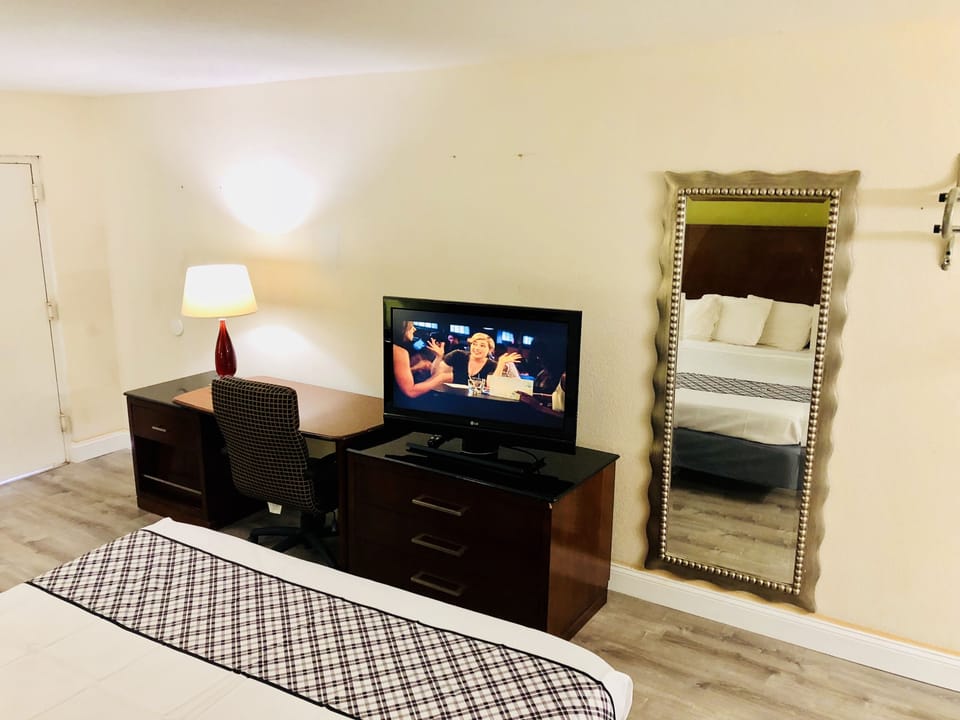 Desk, blackout drapes, soundproofing, iron/ironing board