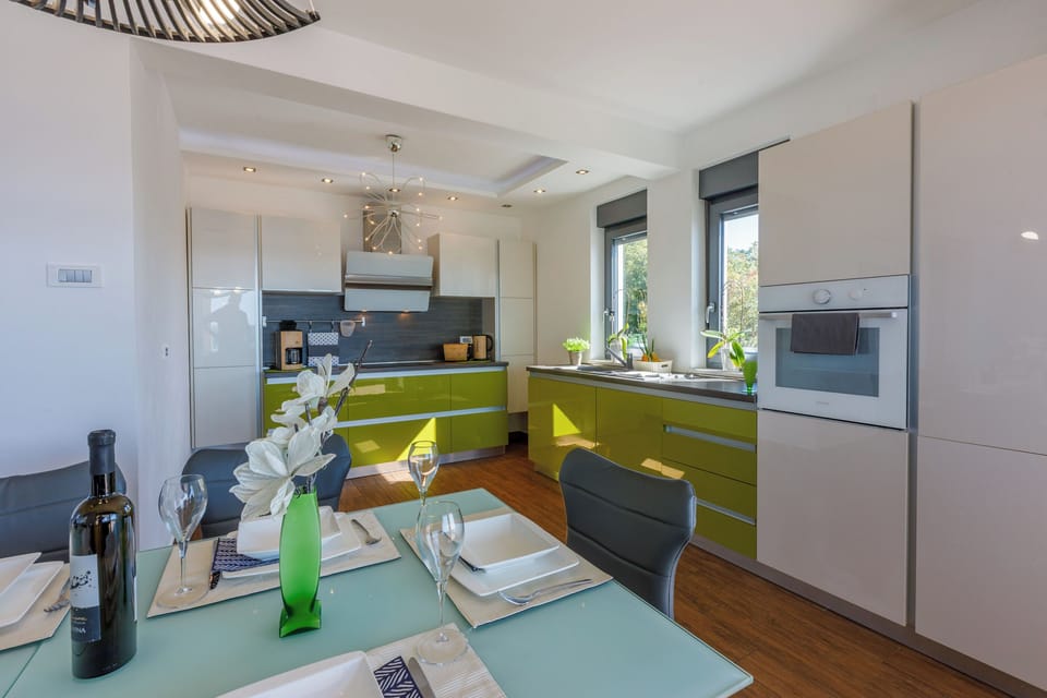 Villa | Private kitchen | Fridge, microwave, oven, stovetop
