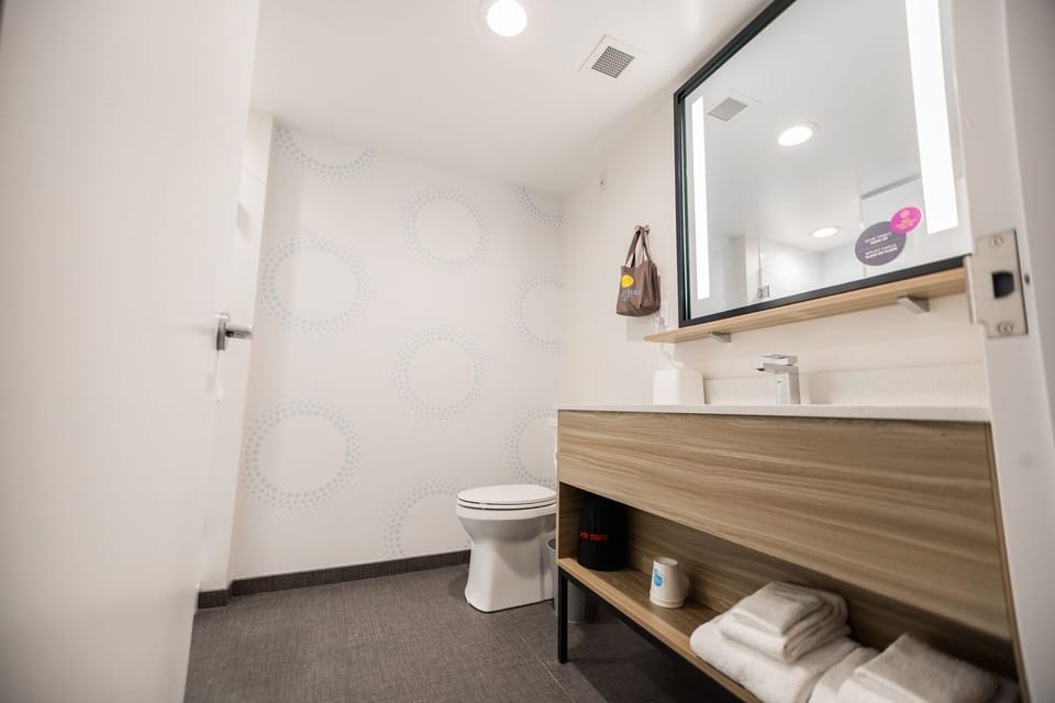 Room, 2 Queen Beds | Bathroom | Shower, hair dryer, towels