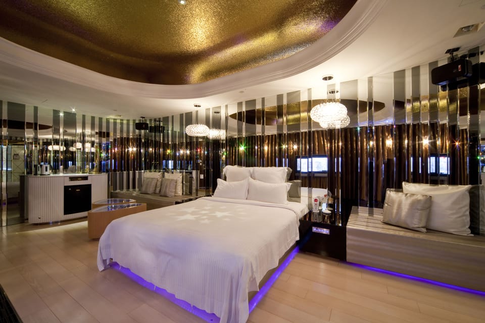 Premium bedding, down comforters, pillowtop beds, free minibar