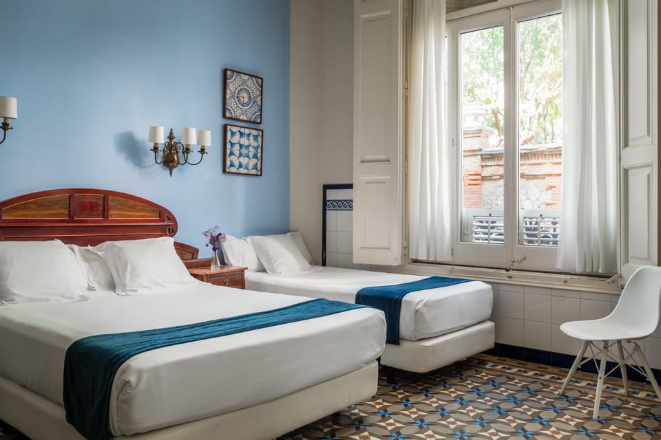 Triple Room | Minibar, in-room safe, free WiFi, bed sheets