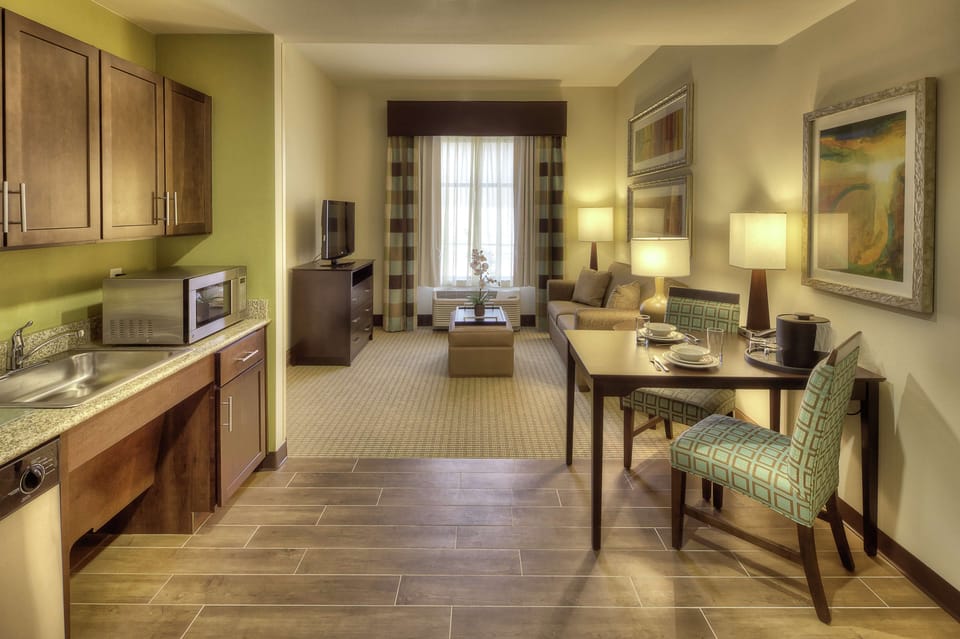 Desk, blackout drapes, cribs (free), WiFi (free)