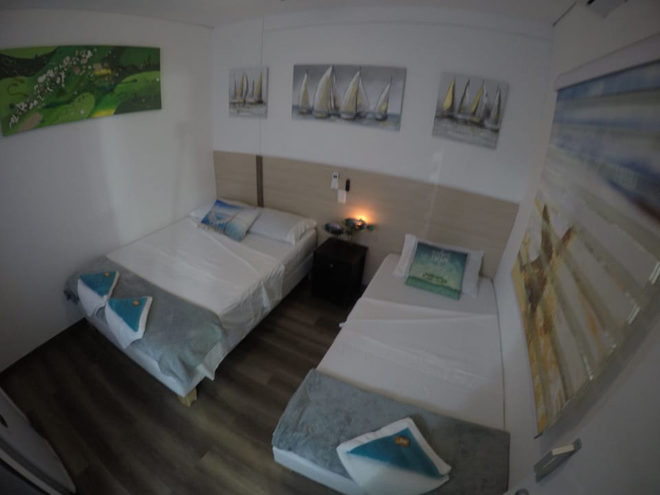 Family Triple Room, 1 Bedroom, Non Smoking | 6 bedrooms, minibar, in-room safe, blackout drapes