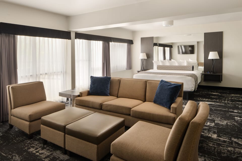 Suite, 1 King Bed, Balcony (Riverside) | Pillowtop beds, desk, laptop workspace, blackout drapes