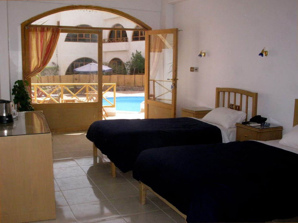 Deluxe Triple Room, 3 Bedrooms | Egyptian cotton sheets, in-room safe, free WiFi, wheelchair access