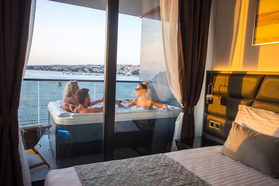 Presidential Suite, Hot Tub, Sea View | Down comforters, memory foam beds, minibar, in-room safe