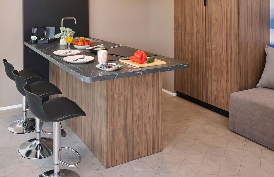Mini-fridge, microwave, stovetop, coffee/tea maker