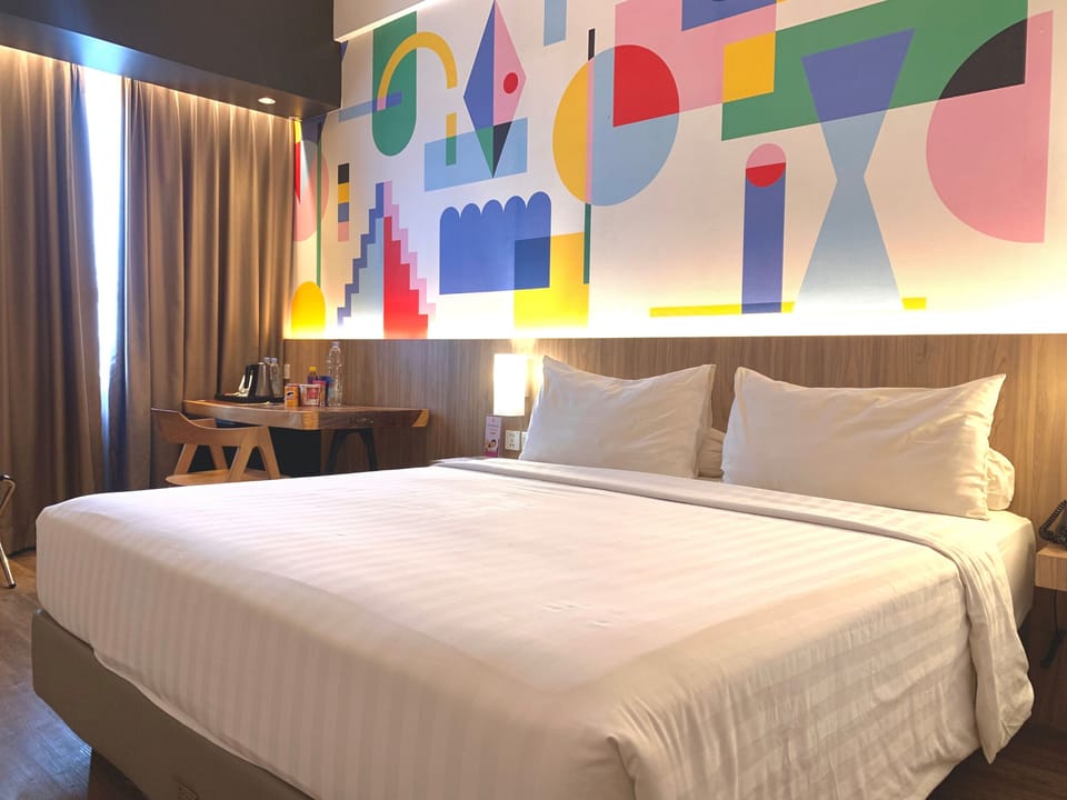 Superior Double Room | Minibar, in-room safe, desk, laptop workspace