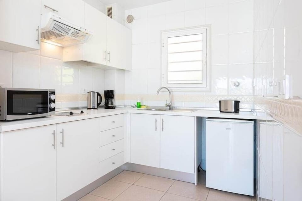 Fridge, microwave, electric kettle, toaster