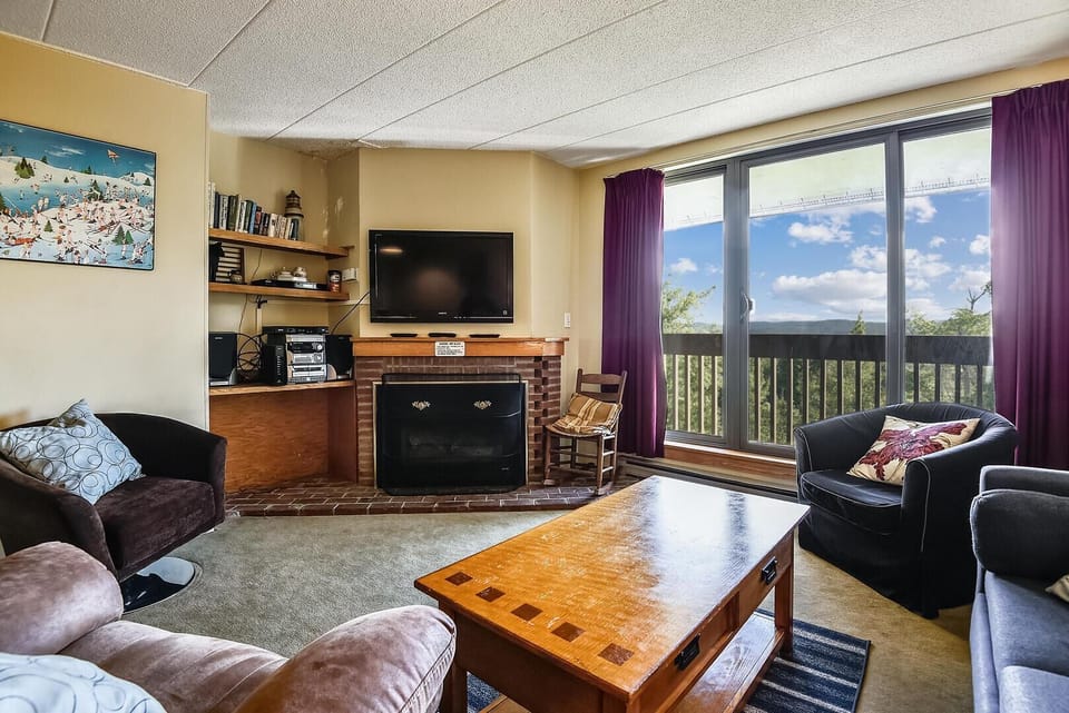 Condo, 1 Queen Bed with Sofa bed (Pinnacle F21) | Living area | Fireplace