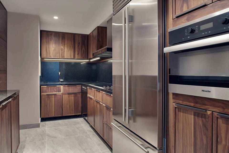 Presidential Suite, 1 King Bed | Private kitchen | Coffee/tea maker, mini-fridge, microwave, oven