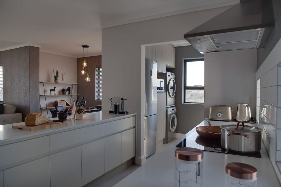 Luxury Apartment | Private kitchen | Full-size fridge, microwave, oven, stovetop