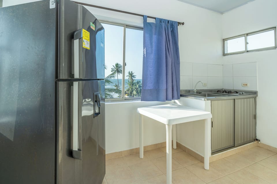Standard Apartment, 2 Bedrooms | Private kitchen | Mini-fridge, microwave, stovetop, cookware/dishes/utensils