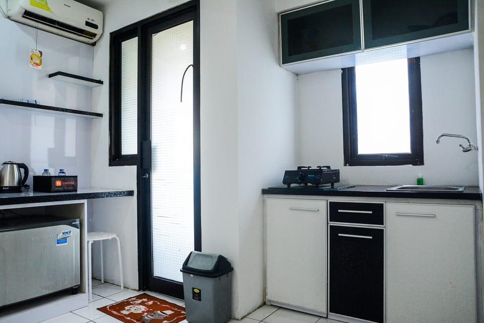 Room | Private kitchen | Fridge, stovetop, electric kettle, cookware/dishes/utensils