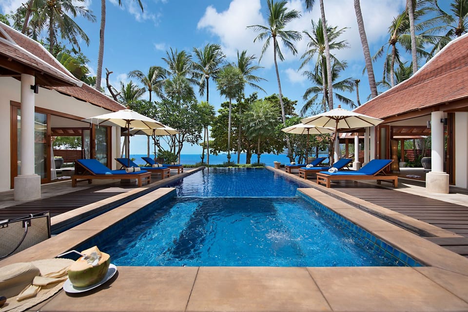 Outdoor pool, pool umbrellas, sun loungers