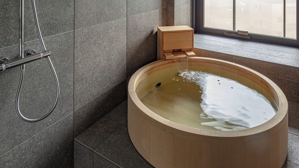 Forest Twin, Non Smoking | Bathroom | Separate tub and shower, free toiletries, hair dryer, slippers
