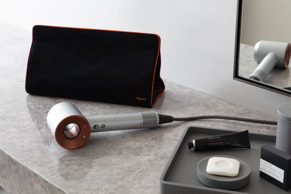 Shower, designer toiletries, hair dryer, towels