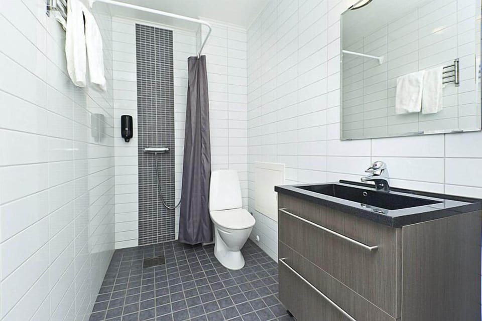 Shower, hair dryer (on request), towels