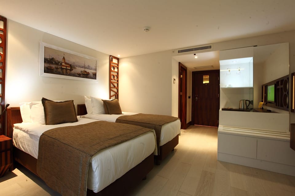 Superior Double or Twin Room | Memory foam beds, minibar, in-room safe, blackout drapes