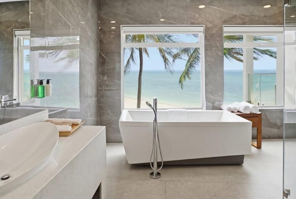 Shower, rainfall showerhead, free toiletries, hair dryer