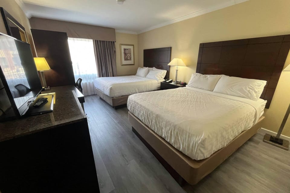 Standard Room, 2 Queen Beds, Non Smoking | Desk, soundproofing, iron/ironing board, free cribs/infant beds