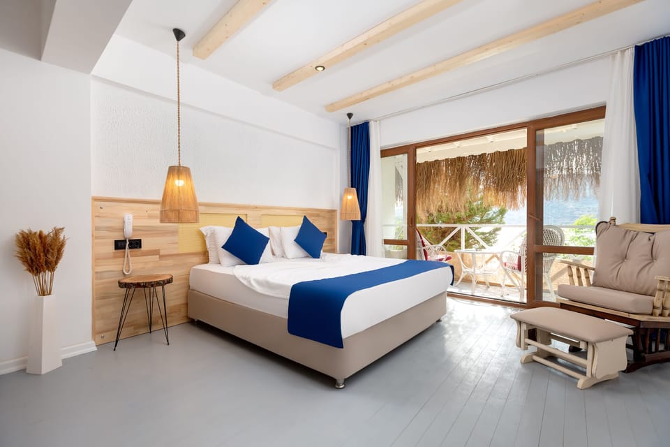 Superior Room, Balcony, Sea View | Minibar, in-room safe, free WiFi, bed sheets