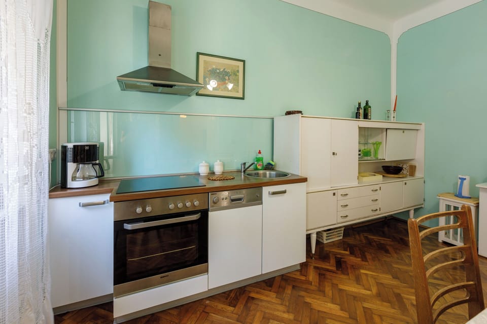 Villa | Private kitchen | Fridge, microwave, oven, stovetop