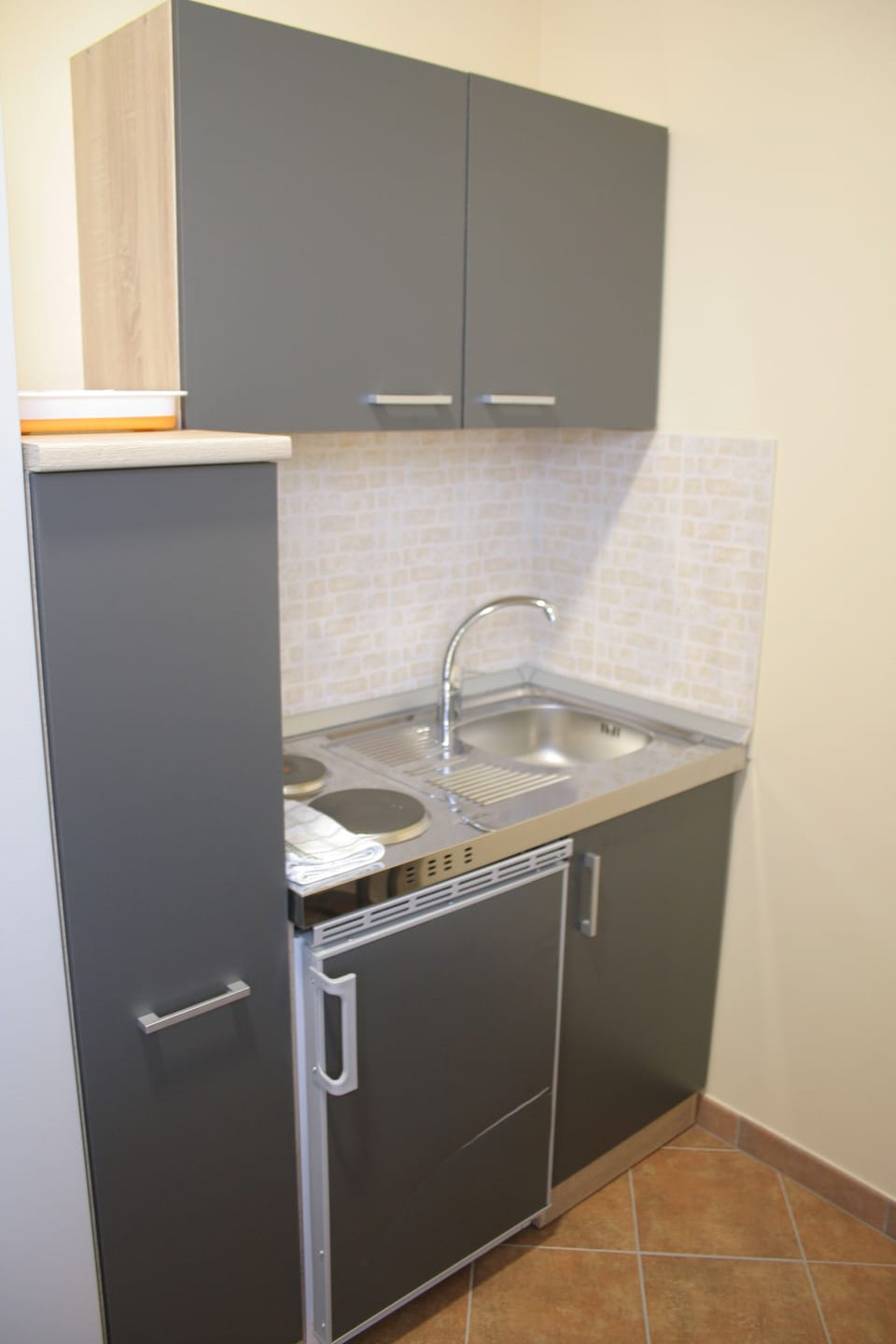 Family Quadruple Room | Private kitchen | Full-size fridge, coffee/tea maker, electric kettle