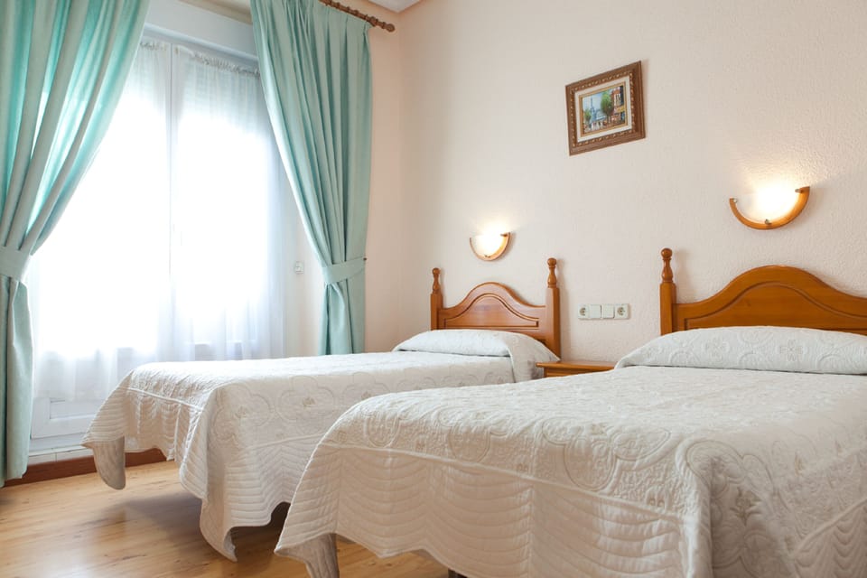 Twin Room | Memory foam beds, desk, free WiFi, bed sheets