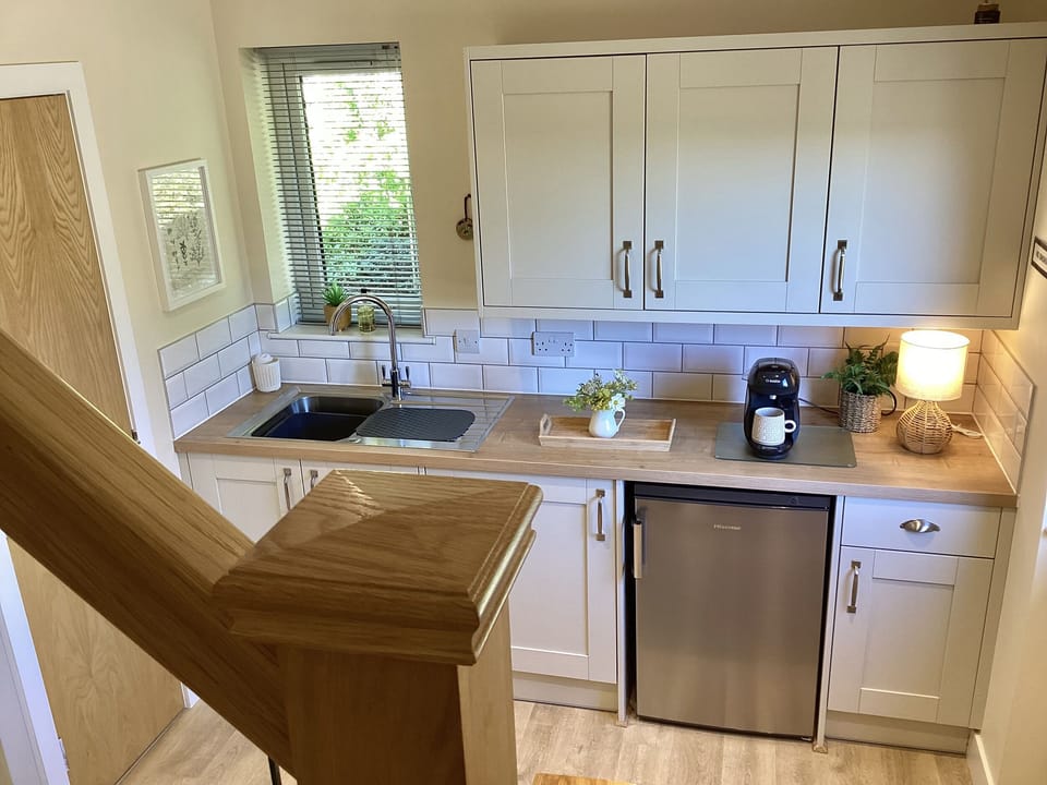 Fridge, microwave, cookware/dishes/utensils