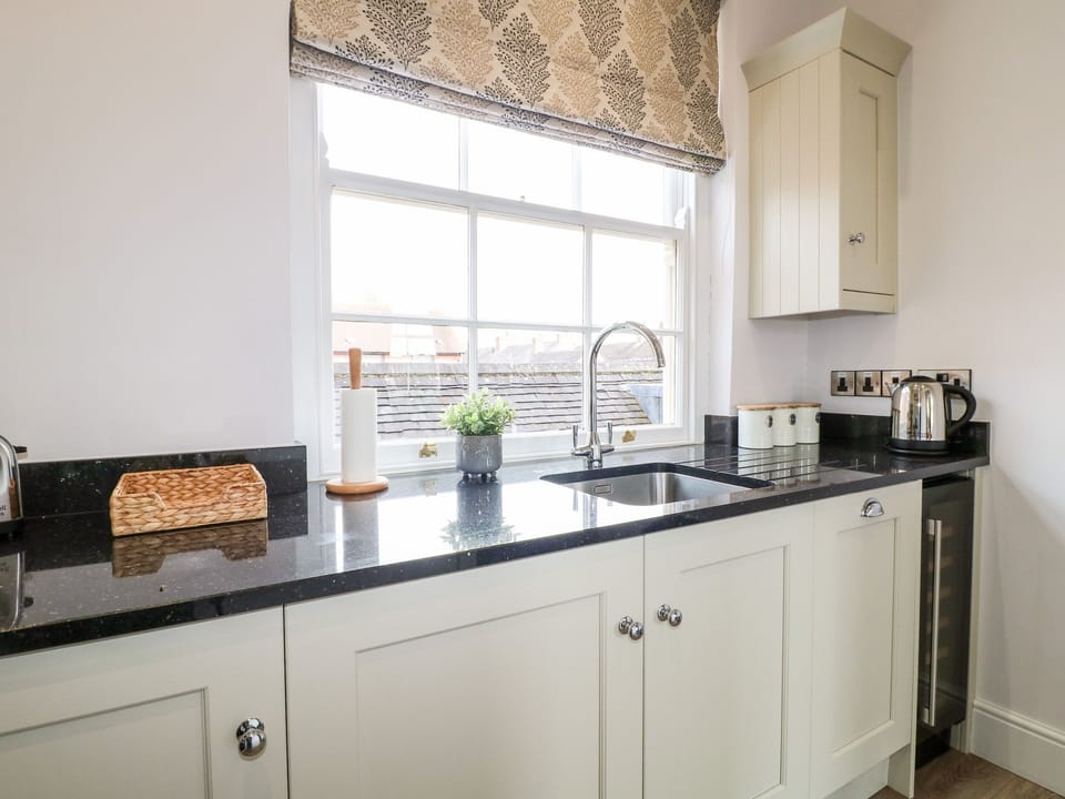 Fridge, electric kettle, toaster, cookware/dishes/utensils