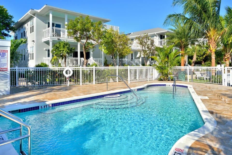 Condo, Multiple Beds (Middle Sunset) | Pool | Outdoor pool, a heated pool