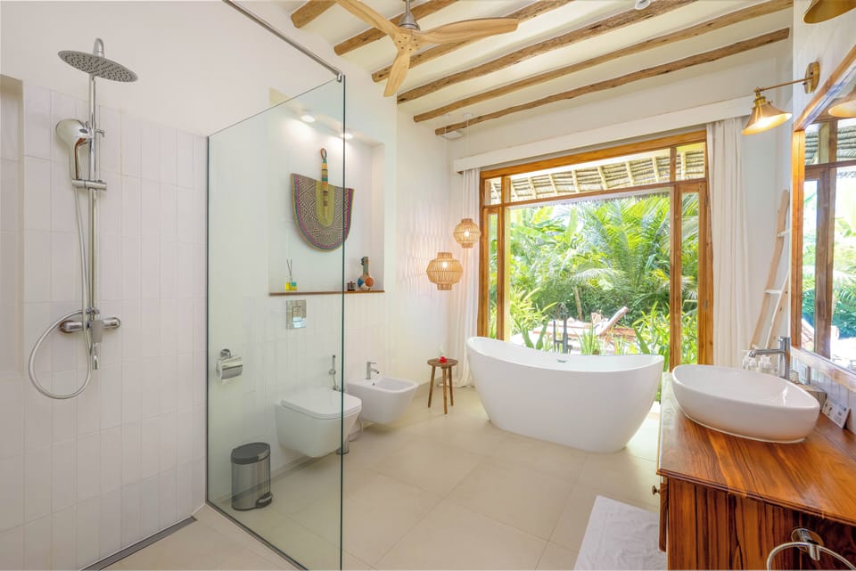 Superior Garden Villa with Plunge Pool | Bathroom | Shower, designer toiletries, hair dryer, slippers