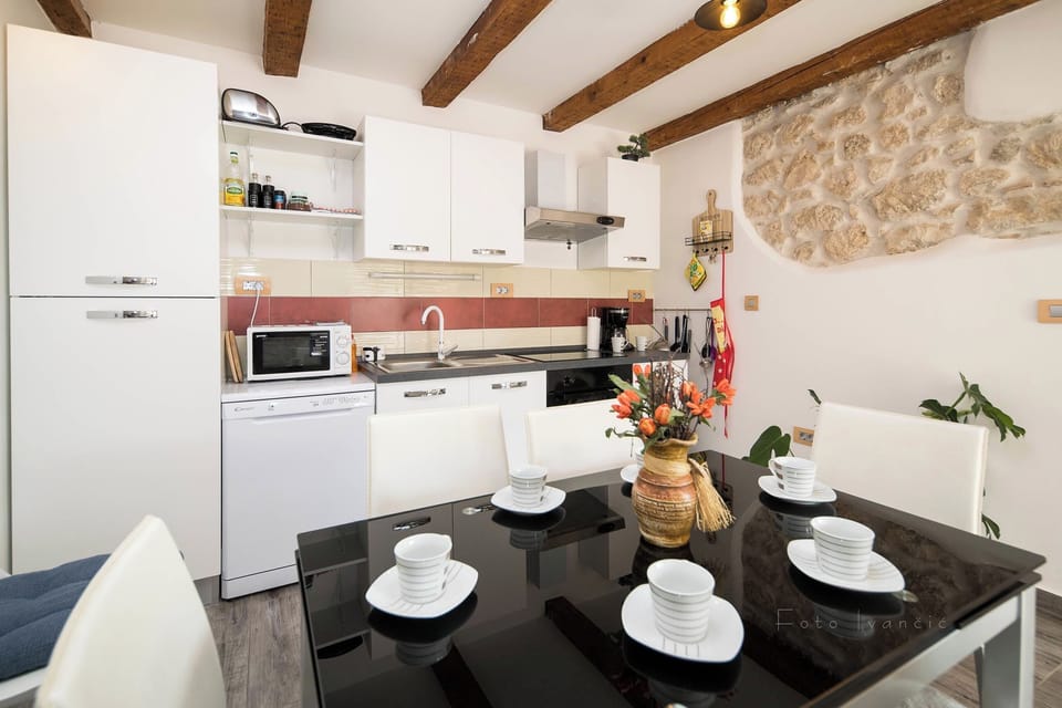 Villa | Private kitchen | Fridge, microwave, oven, stovetop
