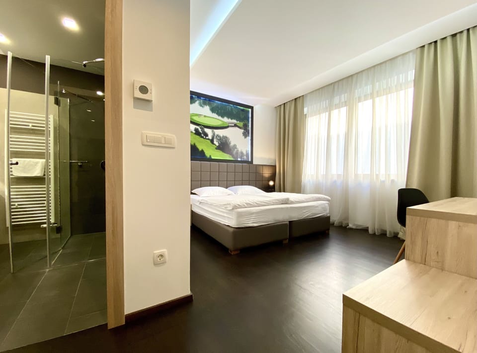 Deluxe Double Room | Desk, blackout drapes, soundproofing, iron/ironing board
