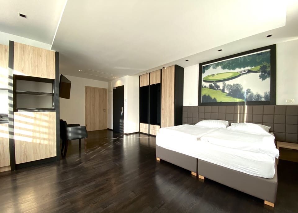Deluxe Apartment, 2 Bedrooms | Desk, blackout drapes, soundproofing, iron/ironing board (on request)