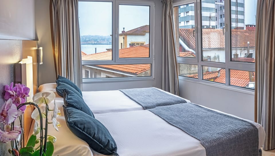 2 single beds | In-room safe, desk, laptop workspace, free WiFi