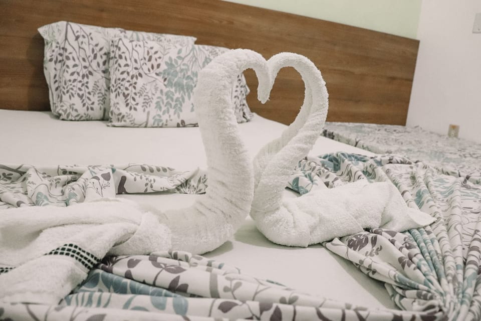 Hypo-allergenic bedding, minibar, desk, iron/ironing board