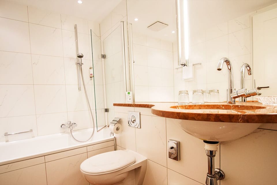 Hair dryer, towels, soap, shampoo